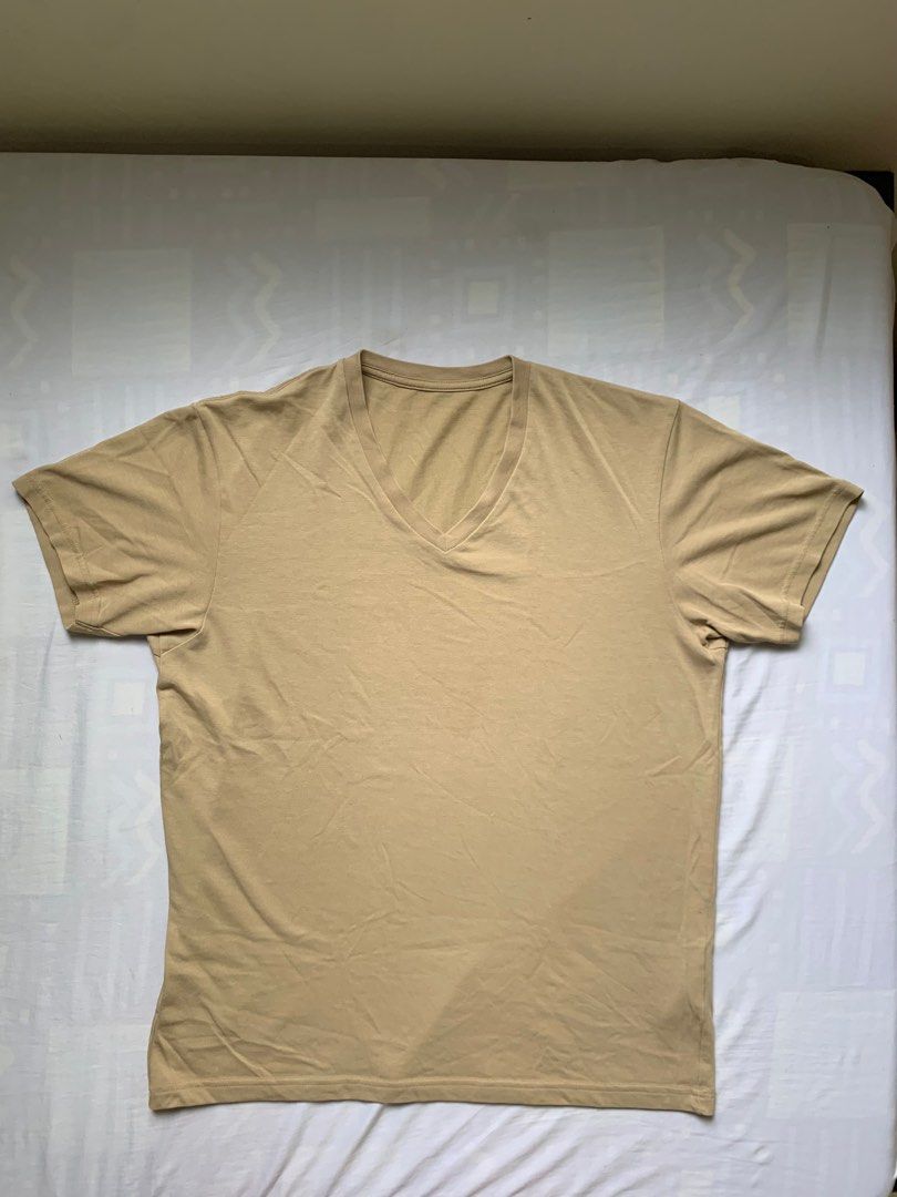 UNIQLO V-neck shirt (Category: Shirts) located in Dumaguete. Submitted by soflow (Listing ID 1243299676, Image 1). Description: UNIQLO shirt, used a few times only M on tag.