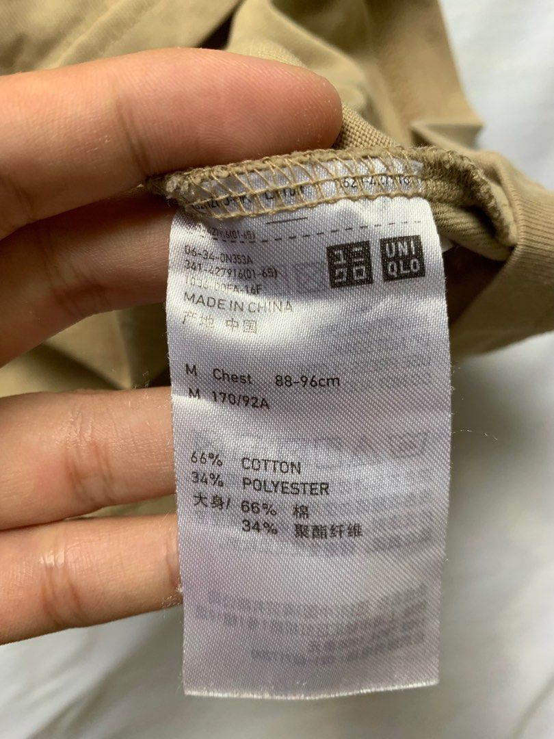 UNIQLO V-neck shirt (Category: Shirts) located in Dumaguete. Submitted by soflow (Listing ID 1243299676, Image 2). Description: UNIQLO shirt, used a few times only M on tag.