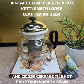 VINTAGE CLEAR GLASS TEA POT KETTLE WITH LOOSE LEAF TEA INFUSER AND CICOSA CERAMIC TILE HOT PAD STAND MADE IN SPAIN