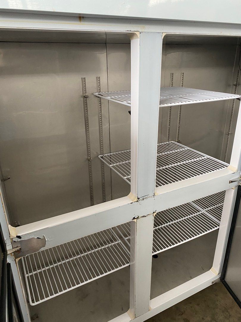 Almost new 6 door upright freezer. Piping cooling. Free deliver and 3