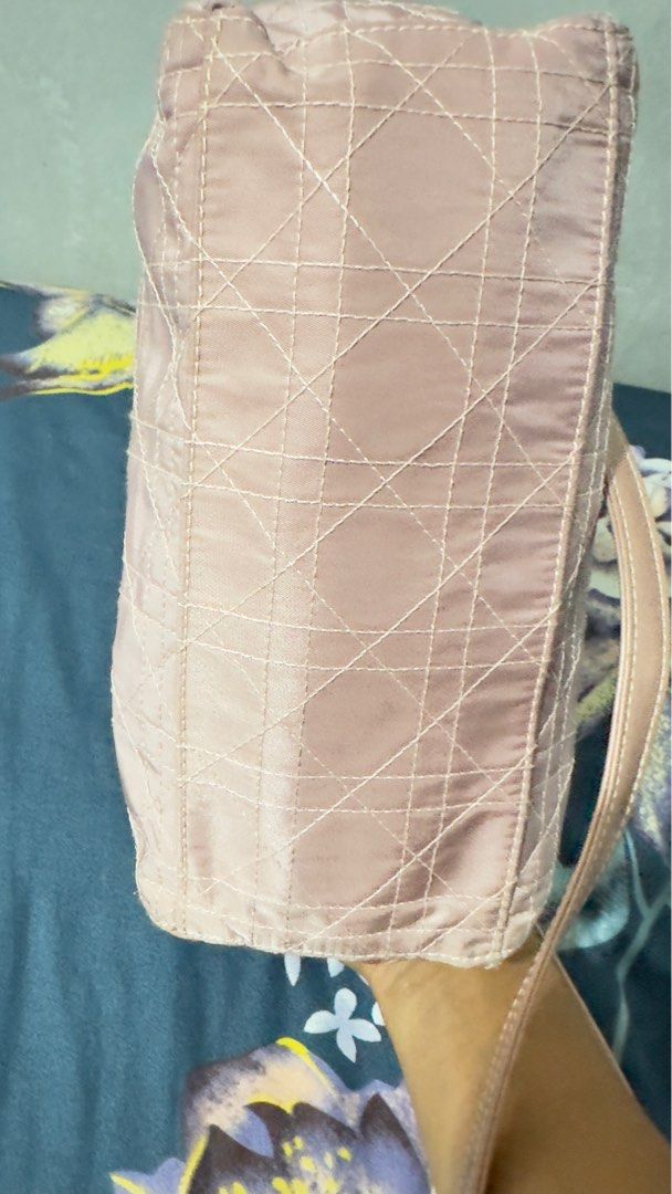 Authentic Christian Dior pink quilted nylon (Category: Luxury Bags & Wallets) located in Makati City. Submitted by pearlclothset (Listing ID 1243615514, Image 3). Description: Vintage lady dior Hand bag. Beautiful rare vintage piece in pink with acrylic clear “crystal” handles. The material is nylon cloth with silver hardware. No damage from inside and outside except for the strap. It’s in a very good condition considering its age. Serial number 