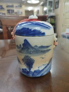 Blue and White Ceramic Lidded Storage Jar Decorated with Simple Landscape Scene

vintage antique