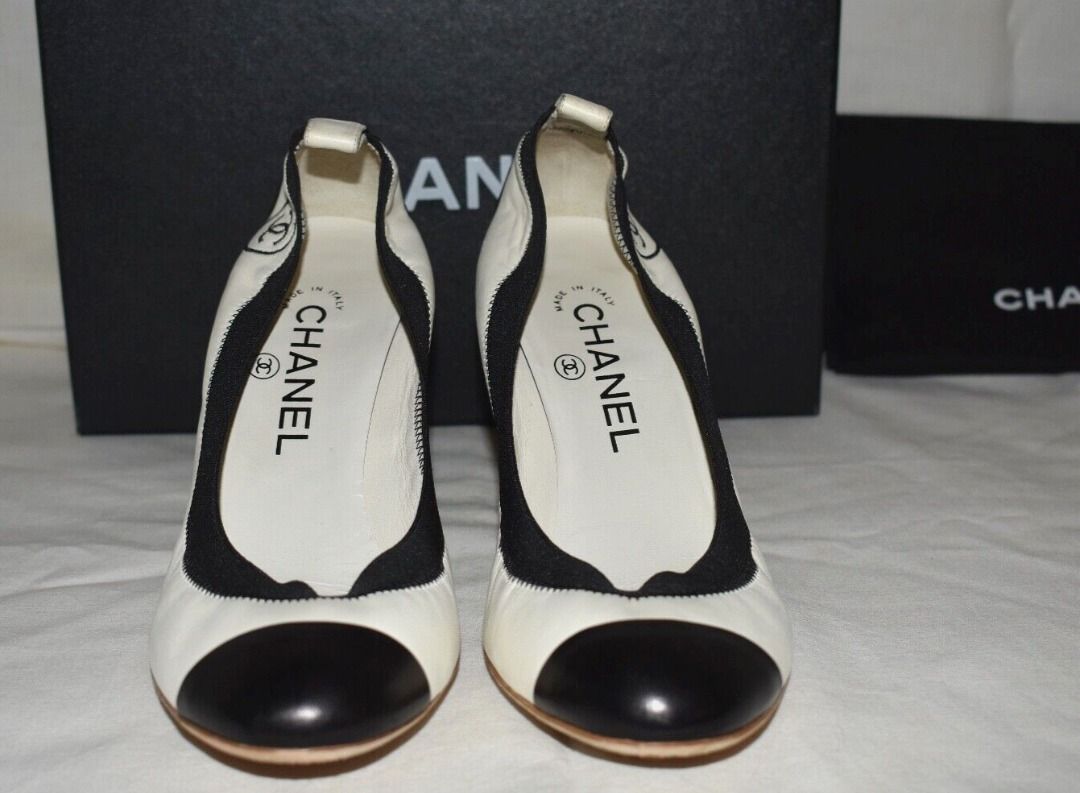 Chanel black discount and white pumps
