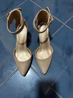Golden glittery high heels sandals