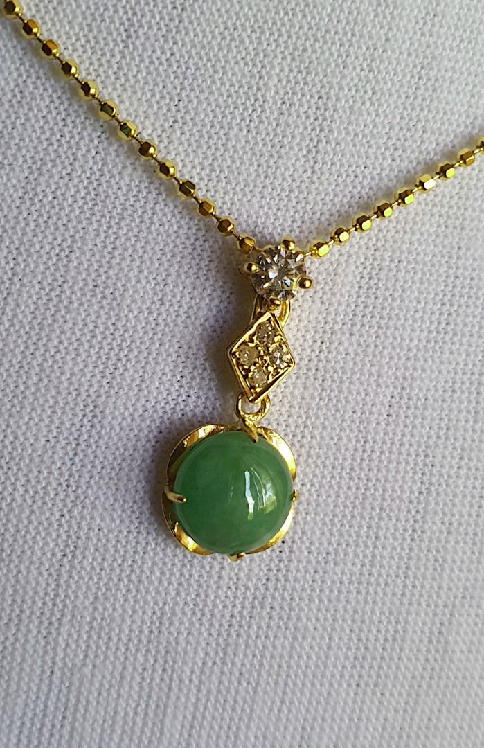 Gold necklace with jade hot sale