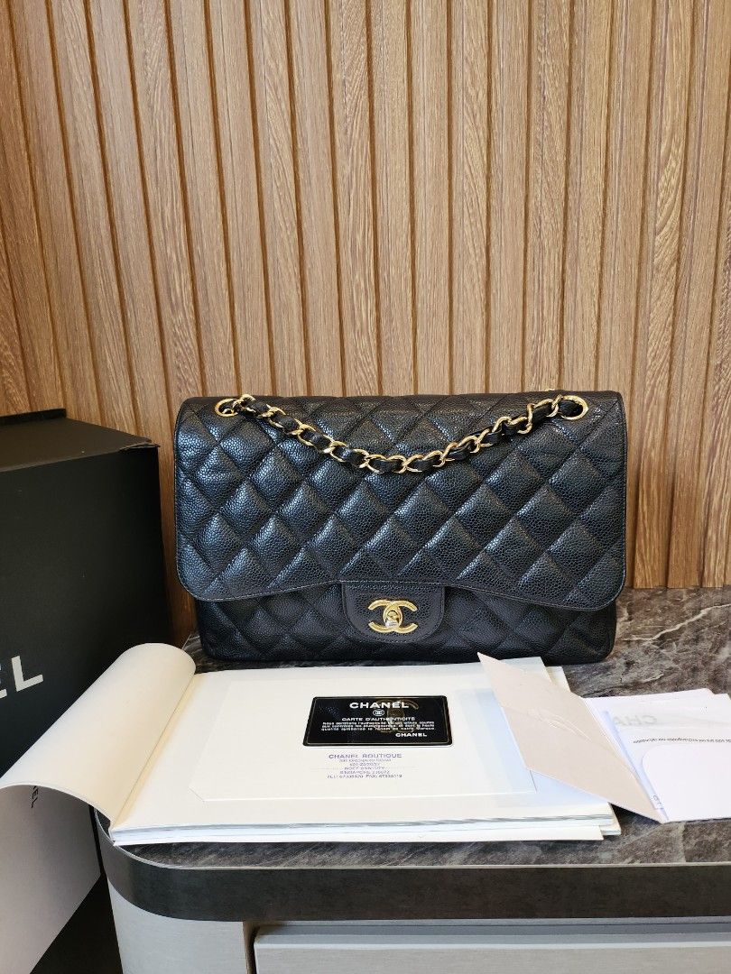 Timeless Fashion: Chanel Black Caviar Jumbo Classic Flap, Black
