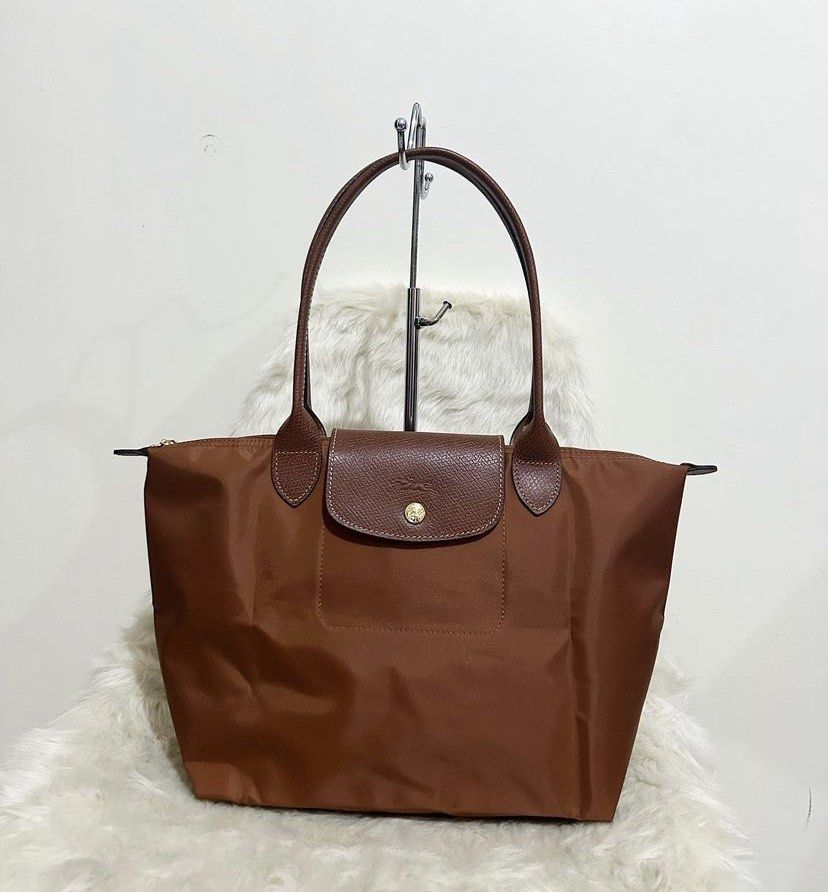 Longchamp Pouch With Handle In Cognac, Luxury, Bags & Wallets on Carousell