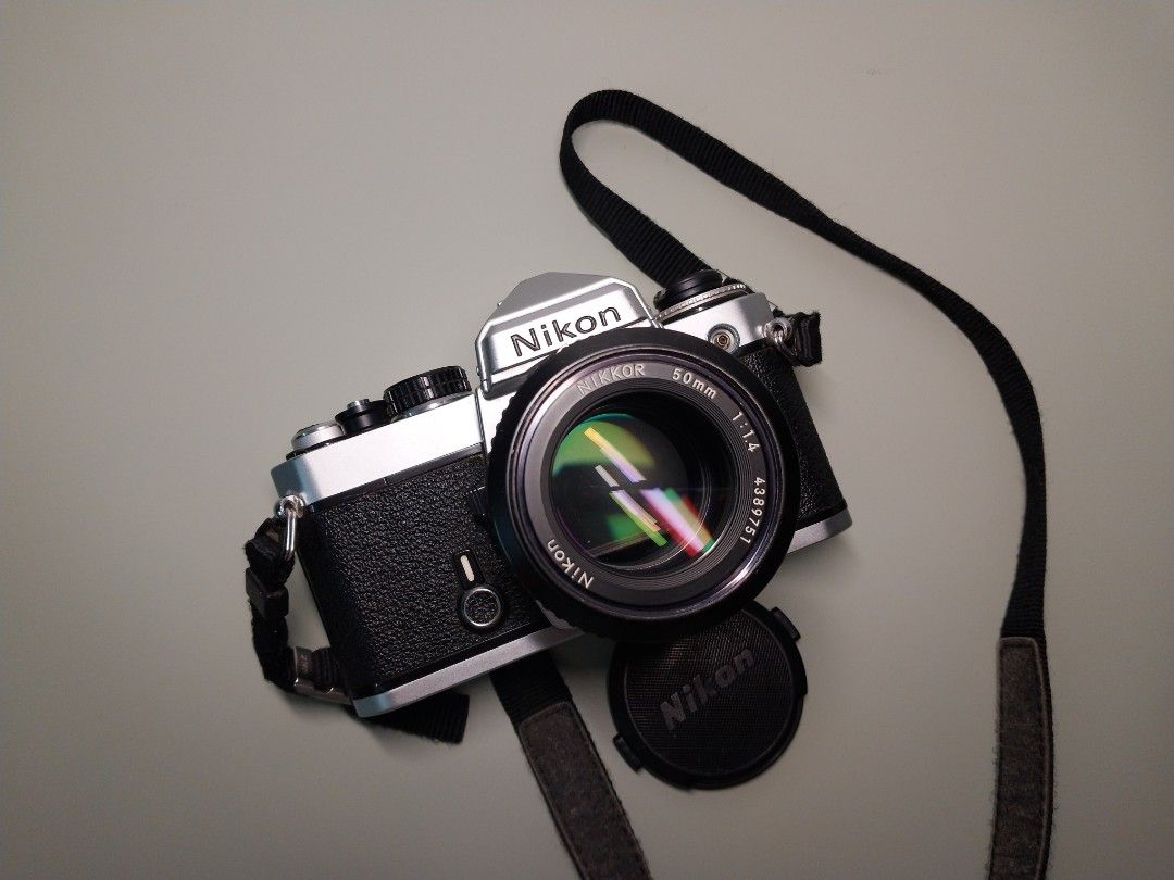 Nikon FE chrome film camera with Nikkor 50mm f1.4 AI lens