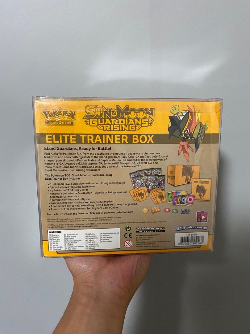 Pokemon Trading Card Game Sun & Moon Guardians Rising Tapu Koko Elite  Trainer Box [8 Booster Packs, 65 Card Sleeves, 45 Energy Cards & More]