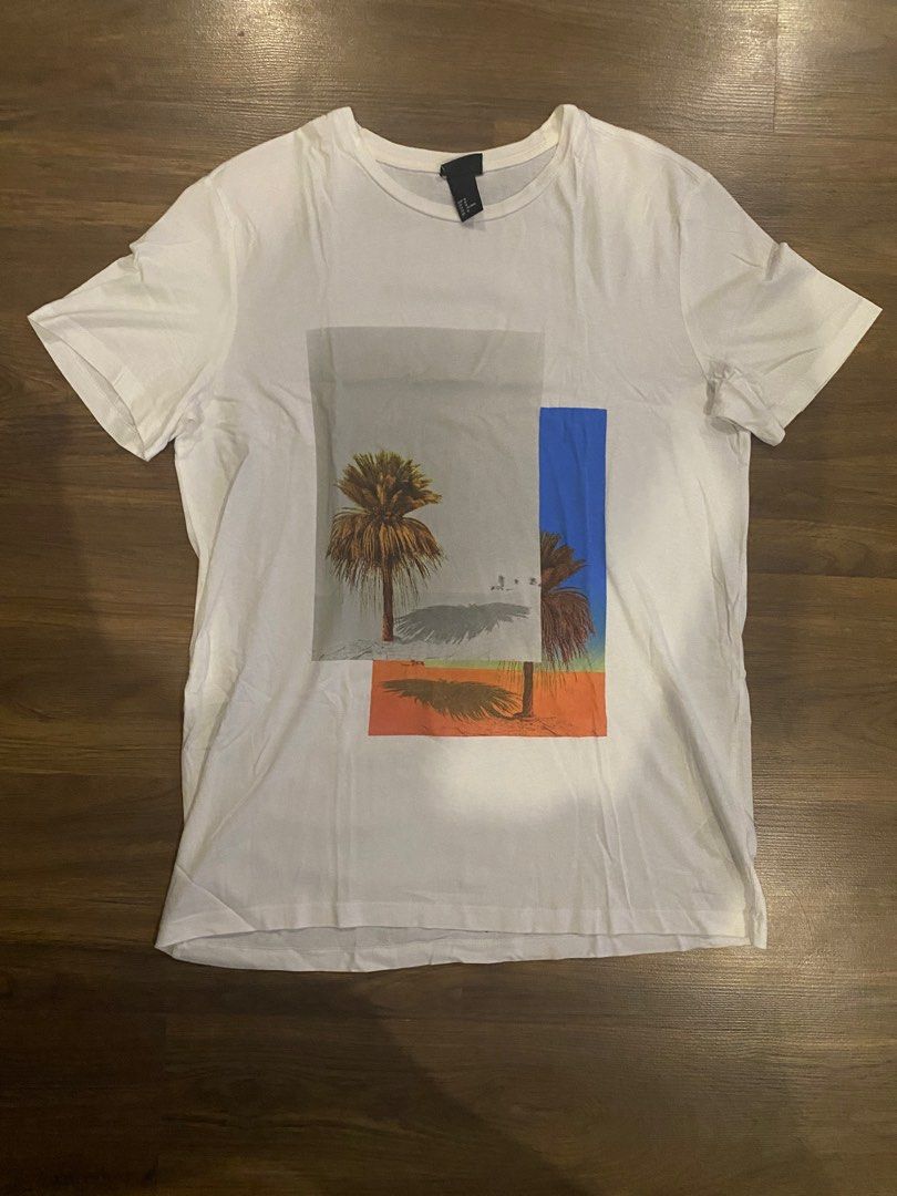 White graphic shirt (Category: Tshirts & Polo Shirts ) located in Cainta. Submitted by chamaleon (Listing ID 1243620747, Image 1). Description: LW: 27x19.5 inches.