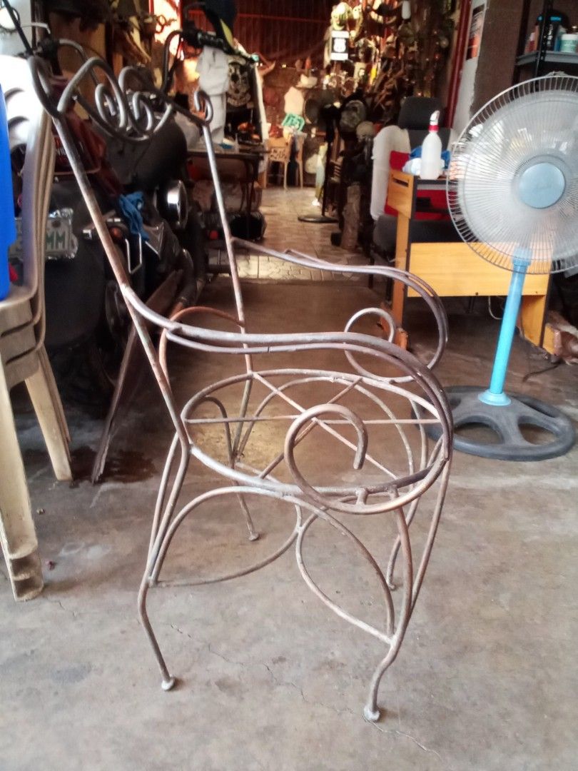 Antique metal arm chair on Carousell