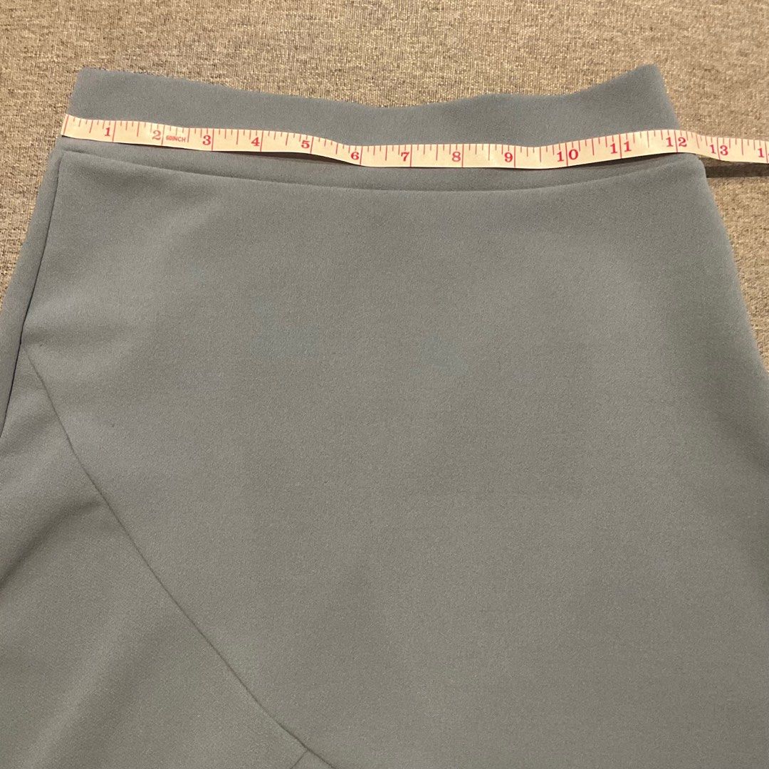 Blue gray ruffle skirt (Category: Skirts) located in Quezon City. Submitted by sudo8 (Listing ID 1243852551, Image 3). Description: Best fits medium Stretchy and hip-hugging Personal favorite .