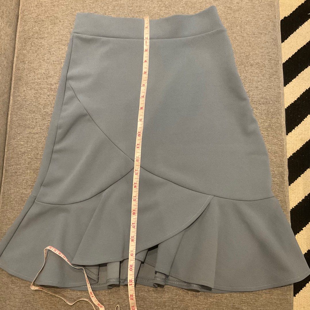 Blue gray ruffle skirt (Category: Skirts) located in Quezon City. Submitted by sudo8 (Listing ID 1243852551, Image 2). Description: Best fits medium Stretchy and hip-hugging Personal favorite .