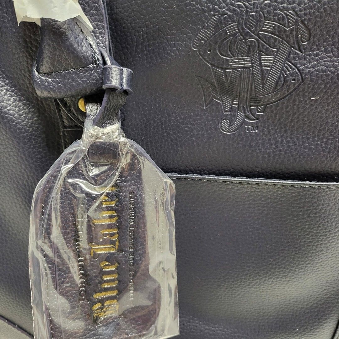 Brand new, wrapped. Johnnie Walker Blue Label sling bag. Black faux