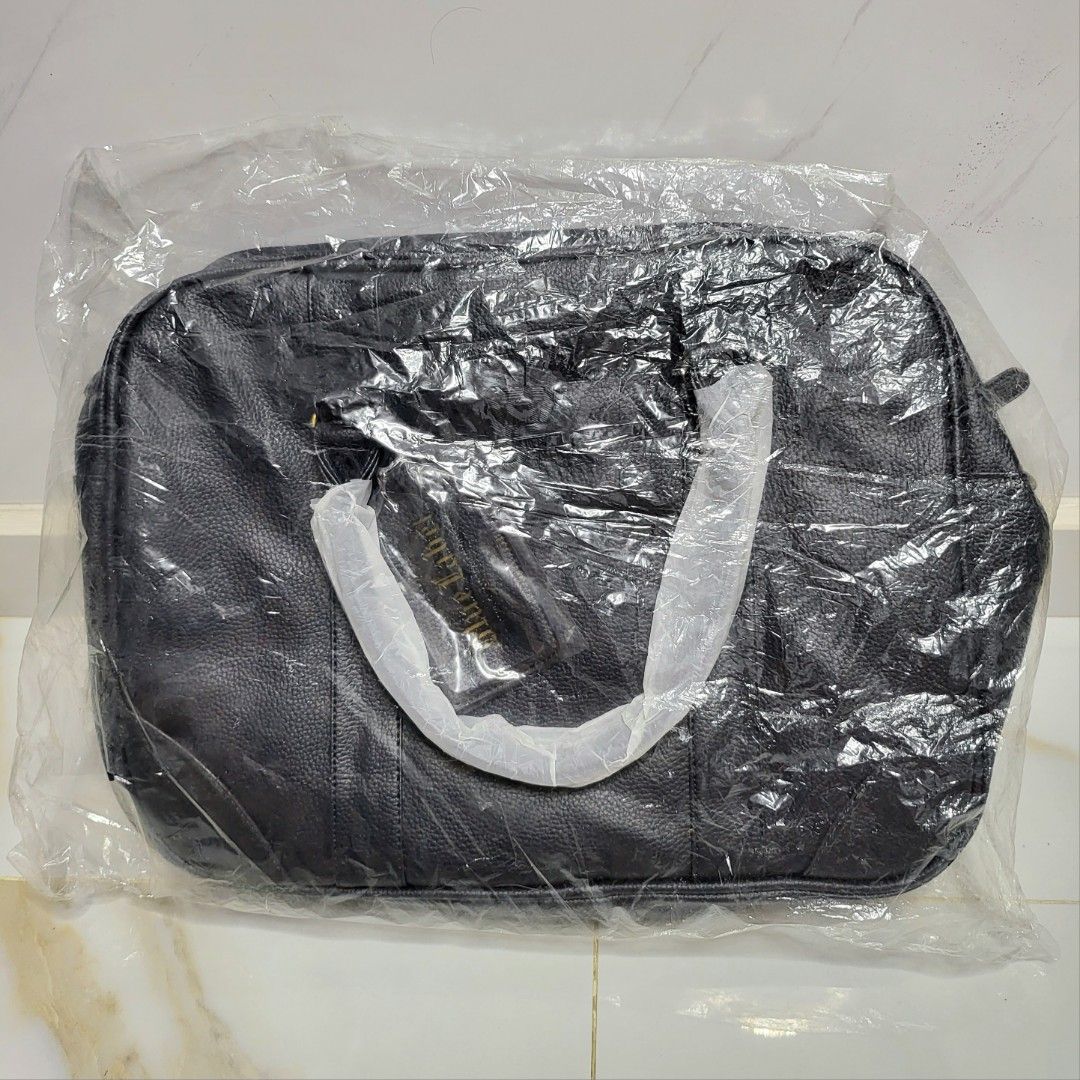 Brand new, wrapped. Johnnie Walker Blue Label sling bag. Black faux