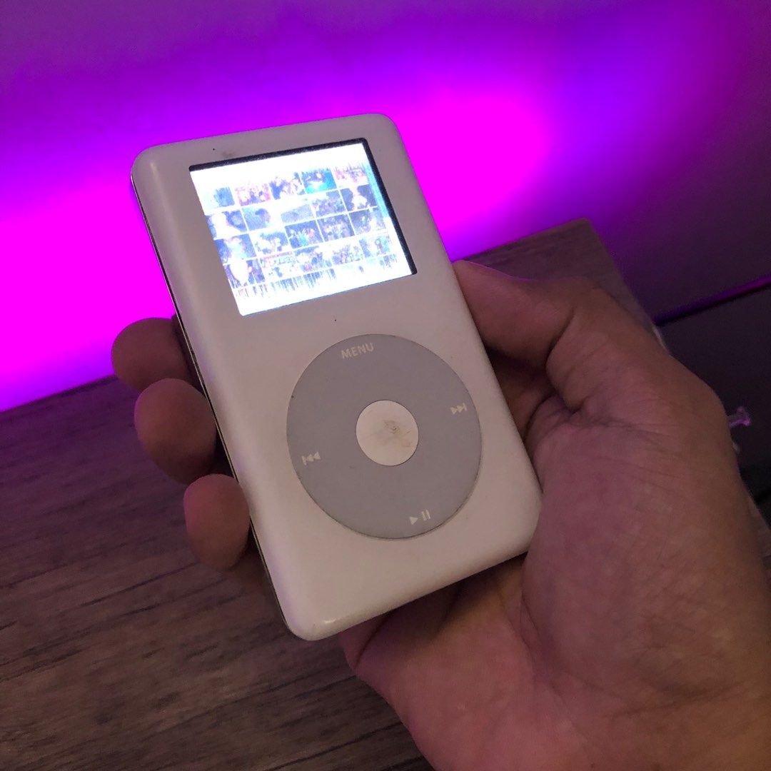 iPod Classic 4th Generation Photo (Category: Other Gadgets) located in Lipa City. Submitted by slicksmithtechnology (Listing ID 1243736727, Image 1). Description: Working, the case has scratches and lcd corner has some white area but doesn’t affect the performance and readability of the content. Battery just recently replaced with brandnew one..