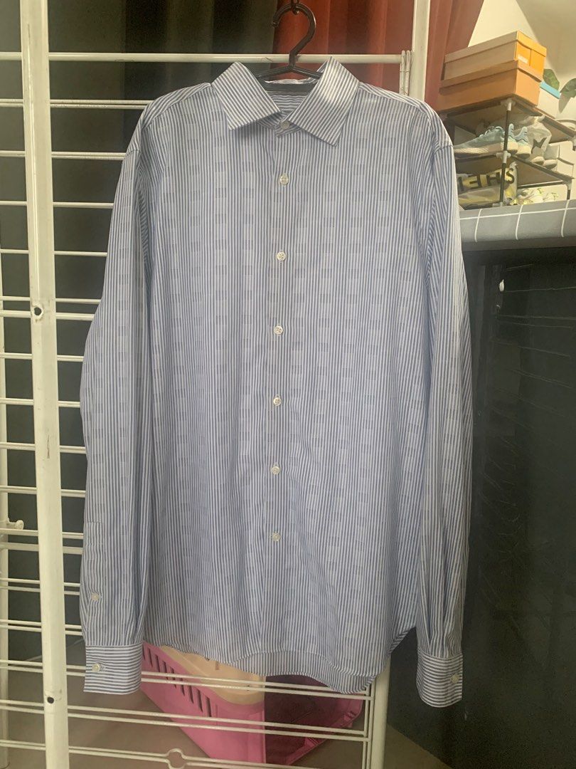 Michael Kors Blue stripes Longsleeve (Category: Formal Shirts) located in Quezon City. Submitted by deamyclutter (Listing ID 1243850995, Image 2). Description: Pre-loved 🥰 Size: M. 15 1/2. Slim Fit Length: 71cm Chest: 53 cm - no original packaging - expect some signs of usage .