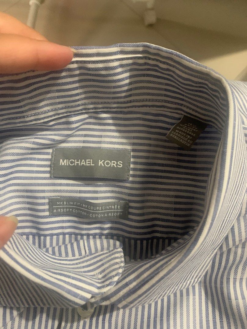 Michael Kors Blue stripes Longsleeve (Category: Formal Shirts) located in Quezon City. Submitted by deamyclutter (Listing ID 1243850995, Image 1). Description: Pre-loved 🥰 Size: M. 15 1/2. Slim Fit Length: 71cm Chest: 53 cm - no original packaging - expect some signs of usage .