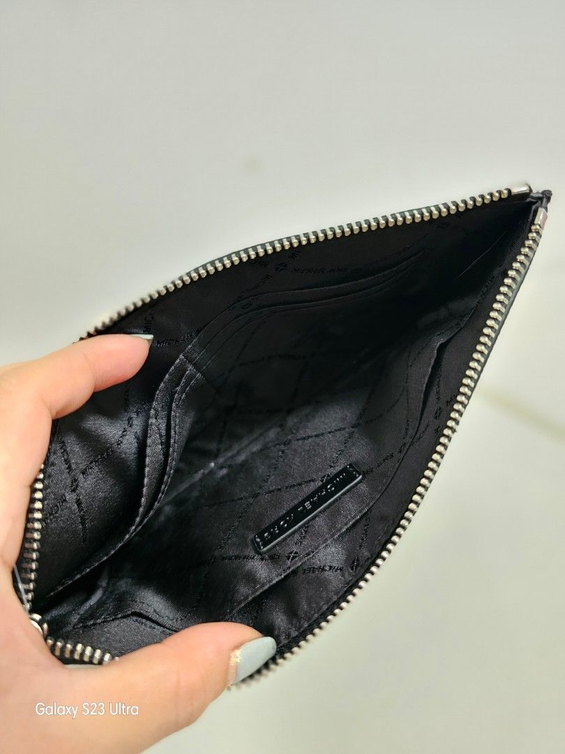 MK Wristlet Clutch Black Mono (Category: Luxury Bags & Wallets) located in Bulacan. Submitted by fazzauthenticgoods (Listing ID 1243770850, Image 3). Description: auth bnew with card slots 8.