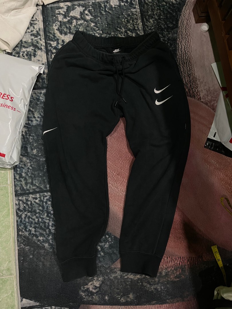 nike double swoosh sweatpants, Men's Fashion, Bottoms, Joggers on Carousell