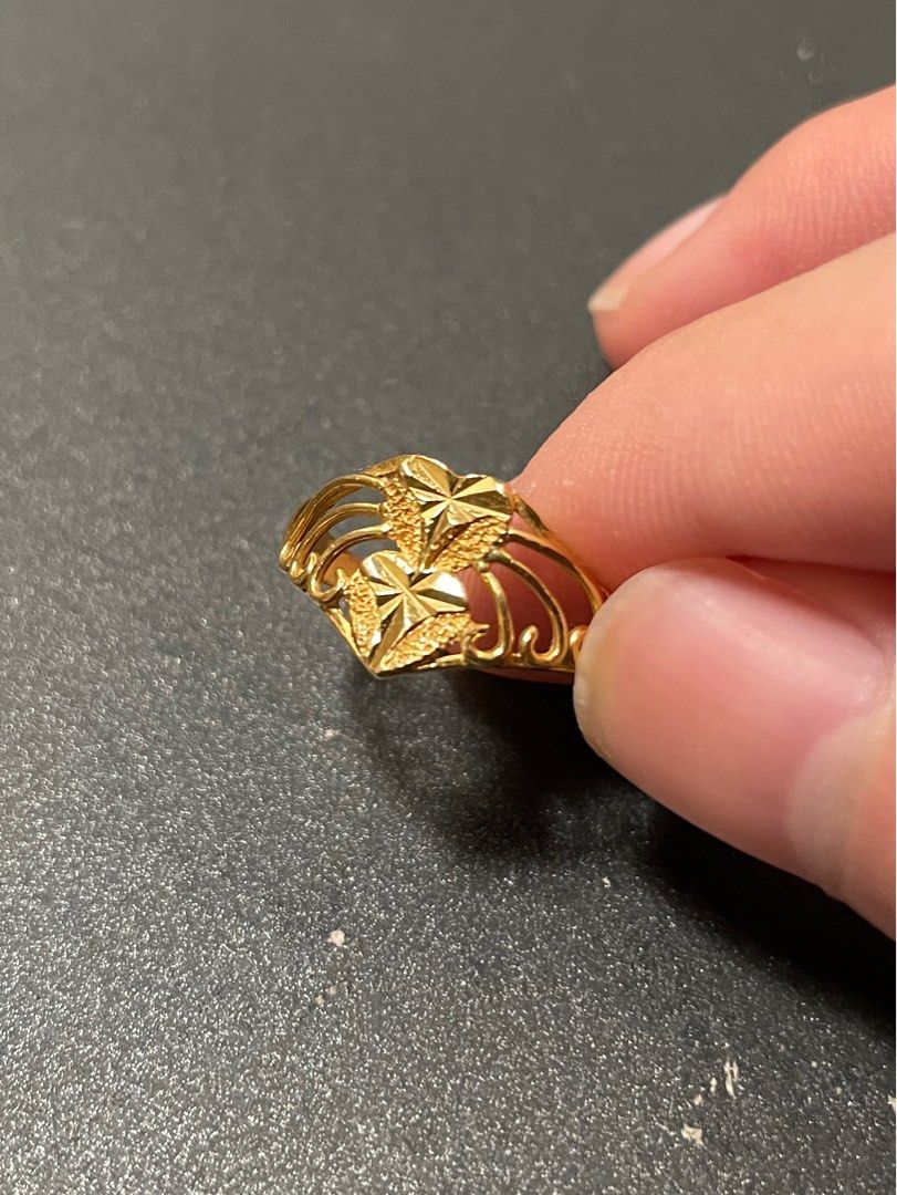 Gold ring with heart shape on sale