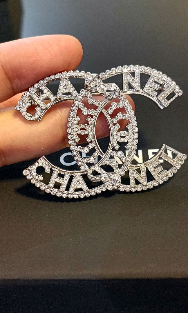 Authentic Chanel Chanel Crystal Bow CC Silver Brooch