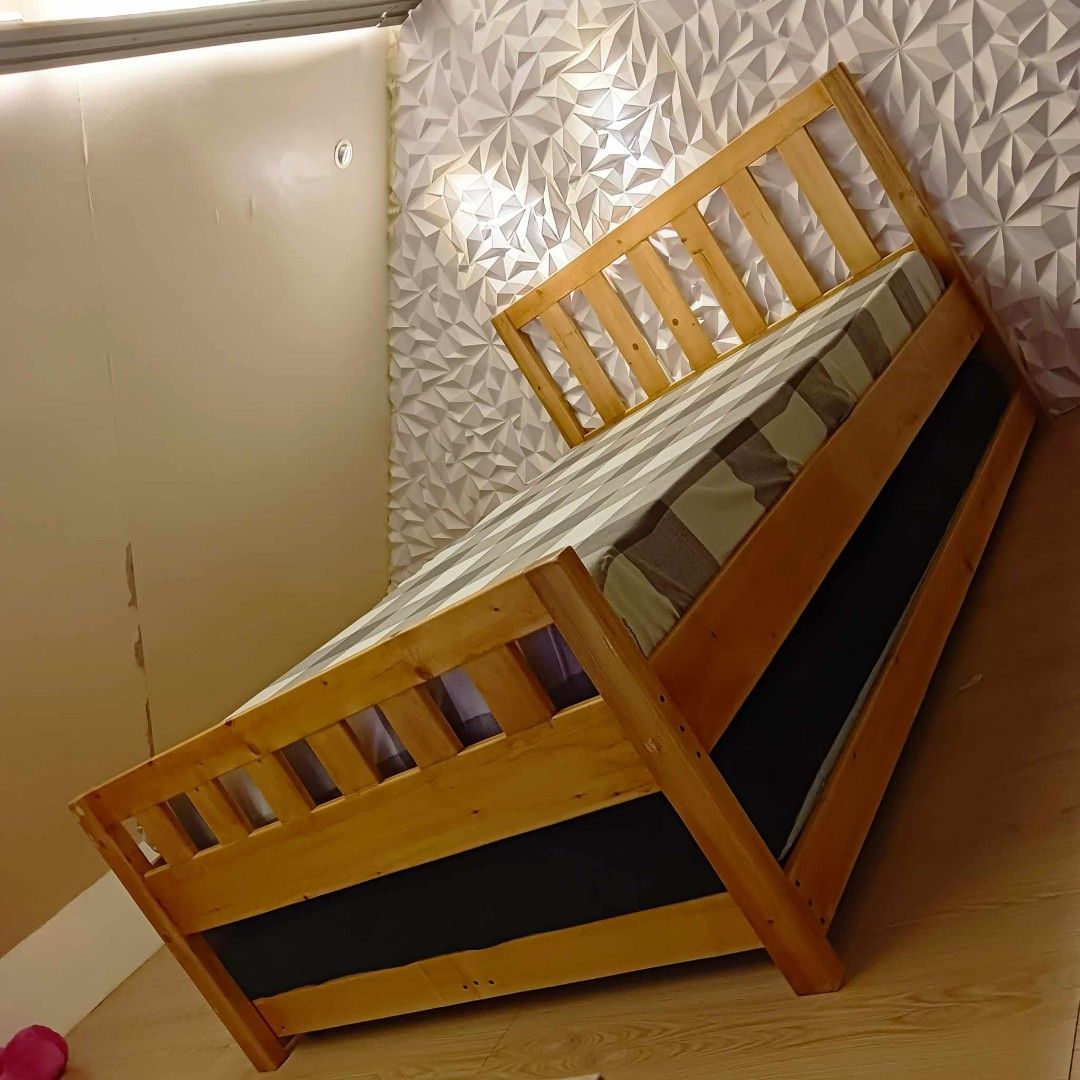 BEDFRAME WITH PULL OUT BED (Category: Bed Frames & Mattresses) located in General Trias. Submitted by jameswoodlike (Listing ID 1244078868, Image 2). Description: BEDFRAME DETAILS IN POST - 48x75 main bed (semi double size) - 48x75 pull out bed (semi double size) - varnish finish - extra spine support for main bed TOTAL PRICE - 11800 but if you'd like semi double 48x75 main bed + single 36x75 for pull out bed - 11500 only! if no pull out - 7500 o