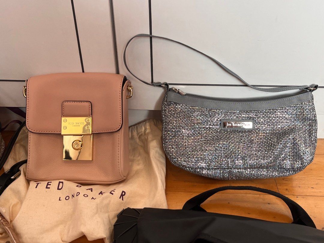brand new and preloved luxury/ branded bags jim thompson silver shoulder bag, agnes b clutch, adidas black backpack, longchamp y2k brown and striped pink bag, marc jacobs/ mandarina duck/ ted baker cross body sling bags, card holder (Category: Bags & Wallets) located in Singapore. Submitted by honeypegasus (Listing ID 1243913925, Image 3). Description: 2nd pic: - boutique silver sling bag, BNIP $20 - adidas miyake roll top black backpack, BNIP $5