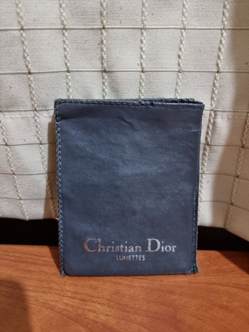 Christian Dior Lunettes Compact Mirror (Category: Face Care) located in Binangonan. Submitted by caaaris (Listing ID 1244030922, Image 2). Description: Christian Dior Lunettes Compact Mirror Comes with a soft sleeve case Authentic With minor signs of use, scuffs and scratches With brown marks caused by moisture in between the layer of silver and the backing material. The marks can be seen in the pictures Minor stitching issue at the top of the sl