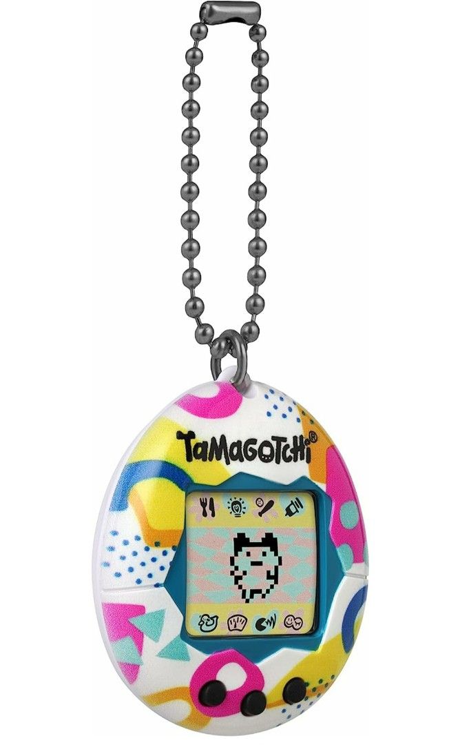 BN Original Tamagotchi Bandai Electronic Toy Virtual Reality Pet Retro Nostalgic Game, Memphis Style (Category: Interactive Toys) located in Singapore. Submitted by the_toy_shoppe (Listing ID 1243996517, Image 3). Description: Brand New, Authentic US import. THE ORIGINAL The Original digital pet you loved in 1997 is back with original programming! Raise your Tamagotchi from egg to child to Adult, and how you take care of it will decide which of t