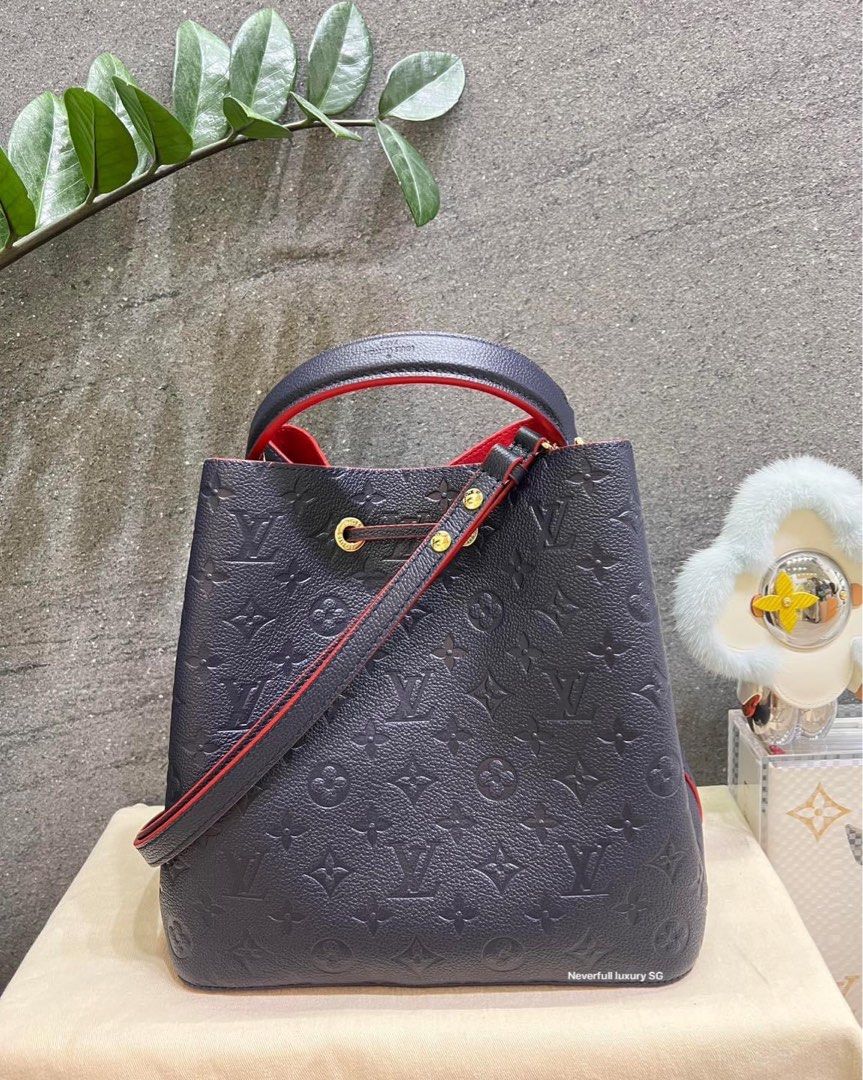 Authentic Louis Vuitton Navy Blue Monogram Empreinte Leather Neonoe MM Bag