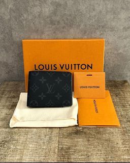 L.V. Black Lambskin Embossed Monogram A4 Puffer Pouch, Luxury, Bags &  Wallets on Carousell