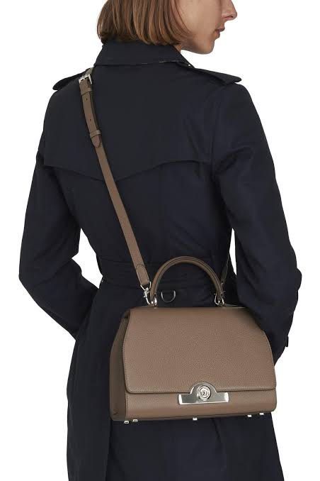 Moynat Rejane MM (Category: Luxury Bags & Wallets) located in Muntinlupa City. Submitted by bagstagram (Listing ID 1197111988, Image 1). Description: The Réjane – the debut handbag to be named after a star, Gabrielle Réjane. First launched in 1903, its clean yet feminine lines evoke detailing from historical Moynat trunks. Crafted using a complex technique known as bords francs in which the leather edges of the piece are all exposed once, each ba