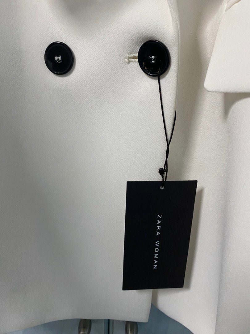 White blazer black buttons hotsell
