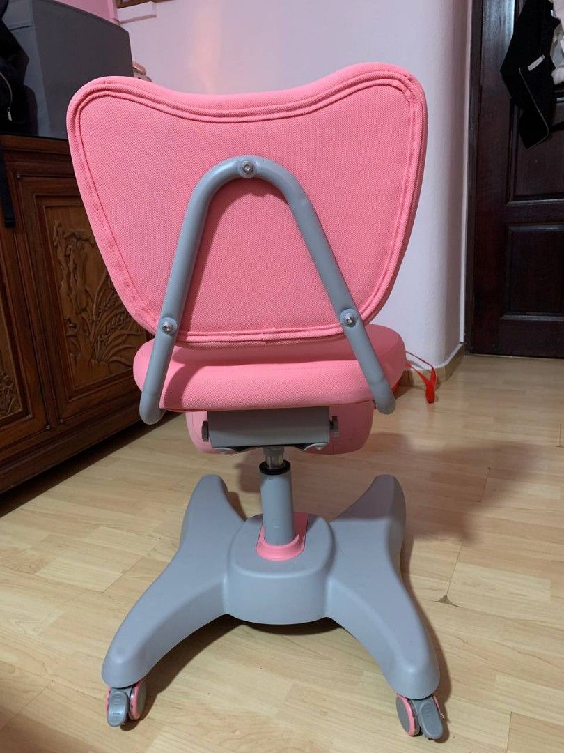 Pink kneeling on sale chair