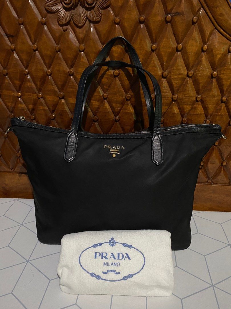 Prada Tessuto Saffiano 2 Way Bag (Category: Luxury Bags & Wallets) located in Angeles City. Submitted by brea.alexandria (Listing ID 1244027757, Image 2). Description: Authentic Prada Nylom 2 way bag. 🖤🖤🖤.