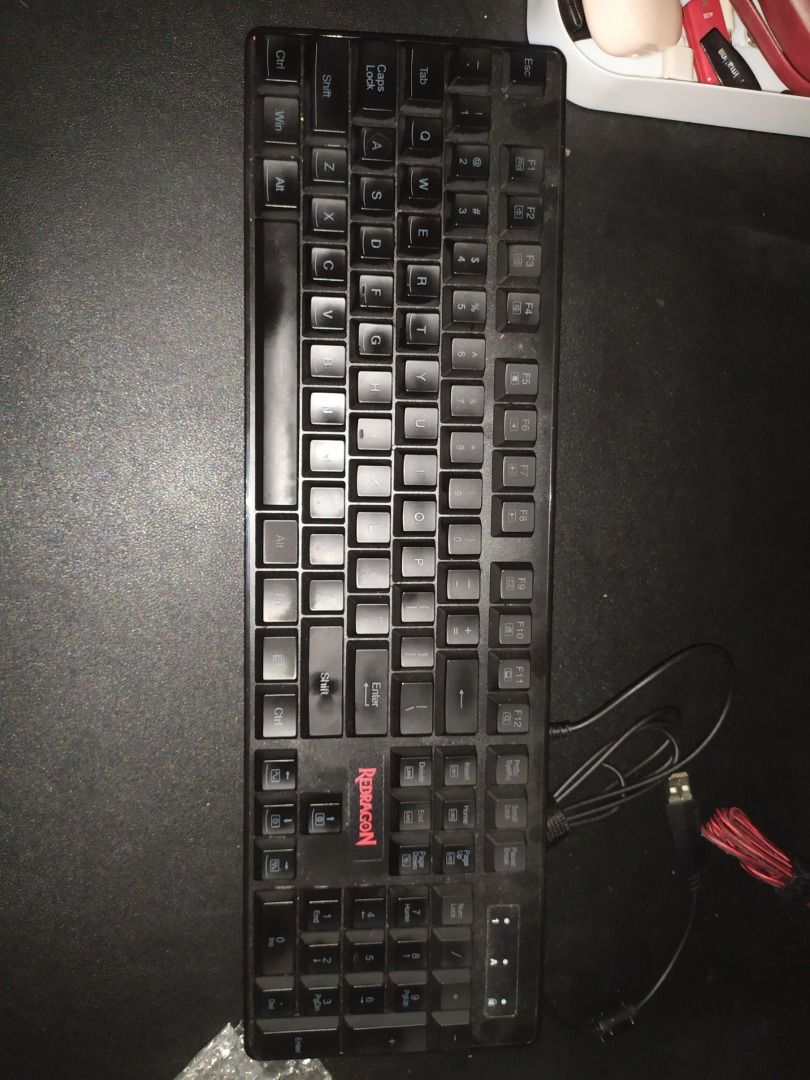 Pre-loved Red Dragon S107 Wired Keyboard and Mousepad (Category: Computer Keyboard) located in Dasmarinas. Submitted by morningdivabeam (Listing ID 1244082108, Image 2). Description: keyboard with signs of usage, mouse not included. Mousepad is brand new. Box damaged so no longer included hence lower price MOUSE PAD GAMING KEYBOARD Combo; The Redragon S107 Gaming Essential includes Premium Large Gaming Mouse Pad, LED RGB 104 key Backlit Mechanica