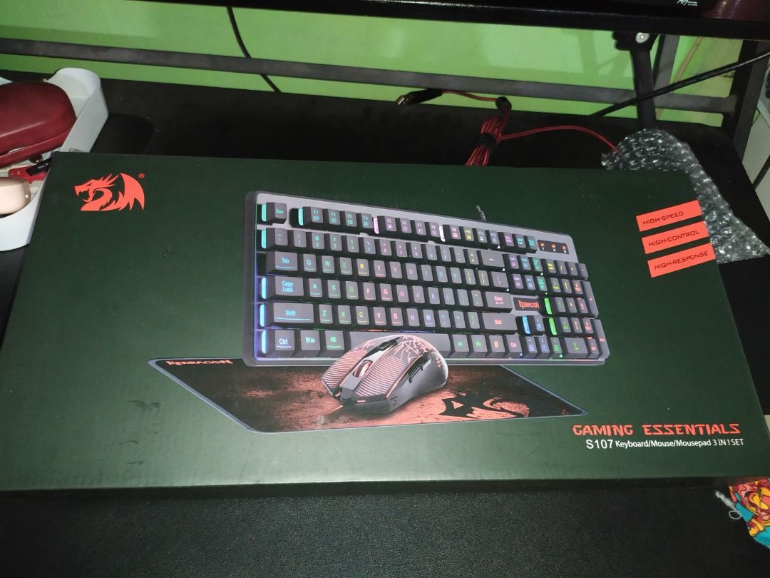 Pre-loved Red Dragon S107 Wired Keyboard and Mousepad (Category: Computer Keyboard) located in Dasmarinas. Submitted by morningdivabeam (Listing ID 1244082108, Image 1). Description: keyboard with signs of usage, mouse not included. Mousepad is brand new. Box damaged so no longer included hence lower price MOUSE PAD GAMING KEYBOARD Combo; The Redragon S107 Gaming Essential includes Premium Large Gaming Mouse Pad, LED RGB 104 key Backlit Mechanica