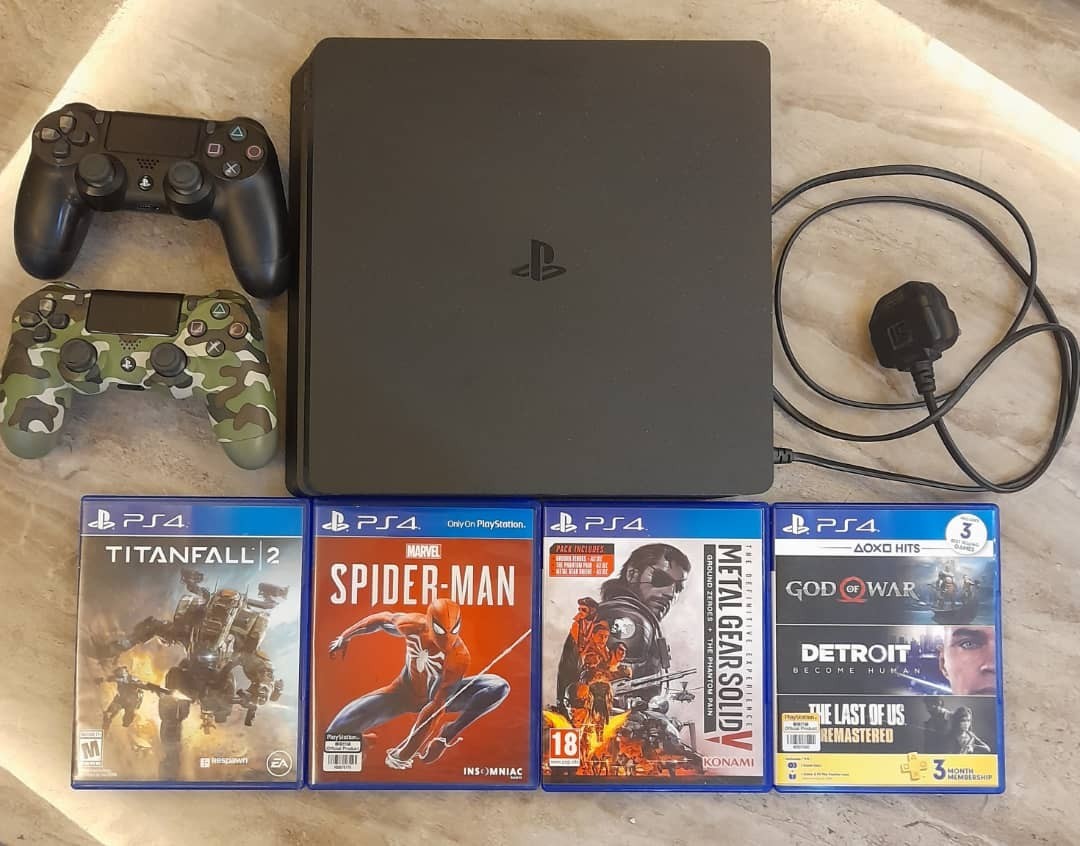 PS4 Pro slim with 2 controllers and 4 DVD games, Video Gaming, Video Game  Consoles, PlayStation on Carousell