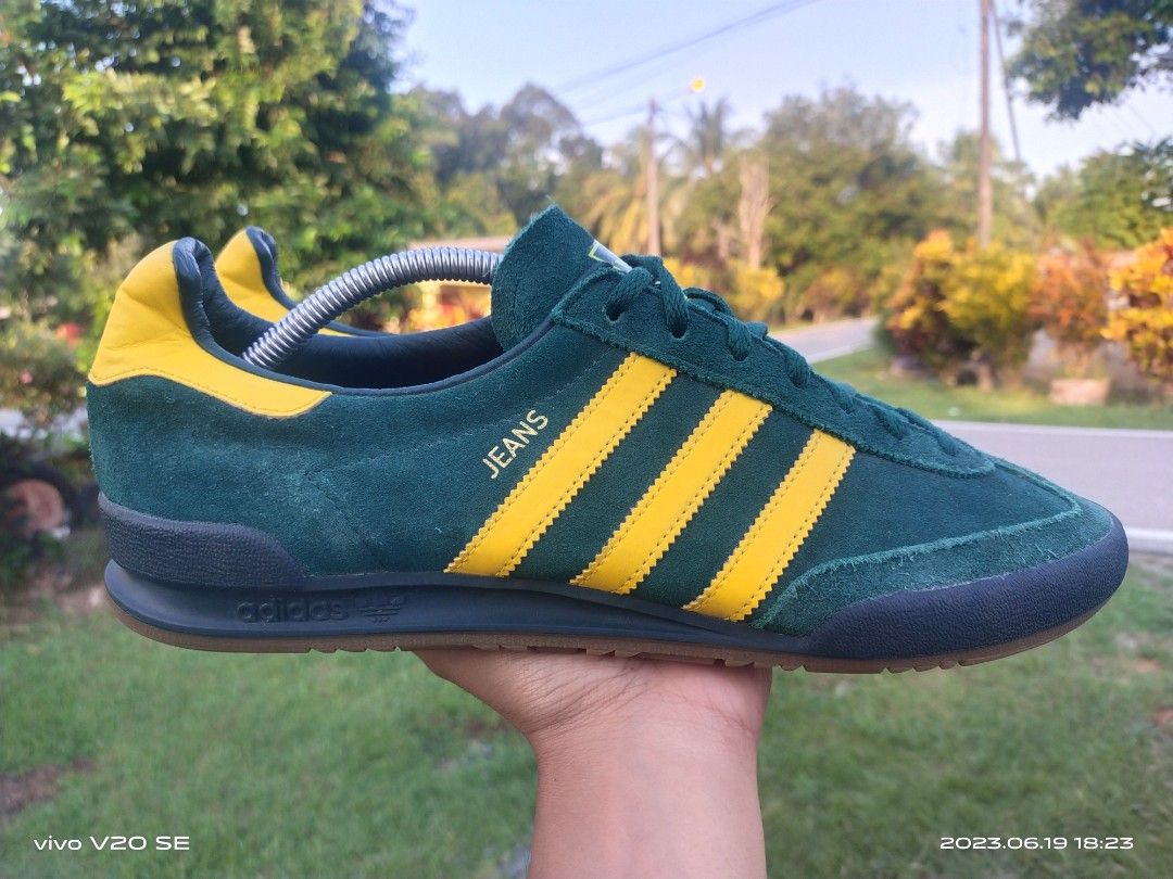 Green and yellow top adidas jeans