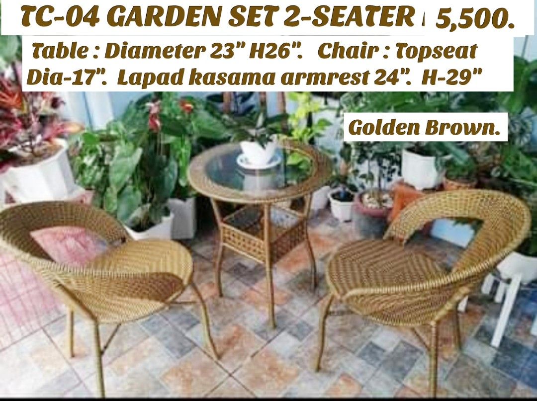 Coffee table and chairs. (Category: Tables & Sets) located in Binan City. Submitted by mark.365 (Listing ID 1240799196, Image 1). Description: Coffee Table set. Plastic Rattan w metal Frame. Golden brown. Black. 2seater P5,500. 4seater P8,500. Pls visit us on FB. Bonifacio NBE Sales Center..
