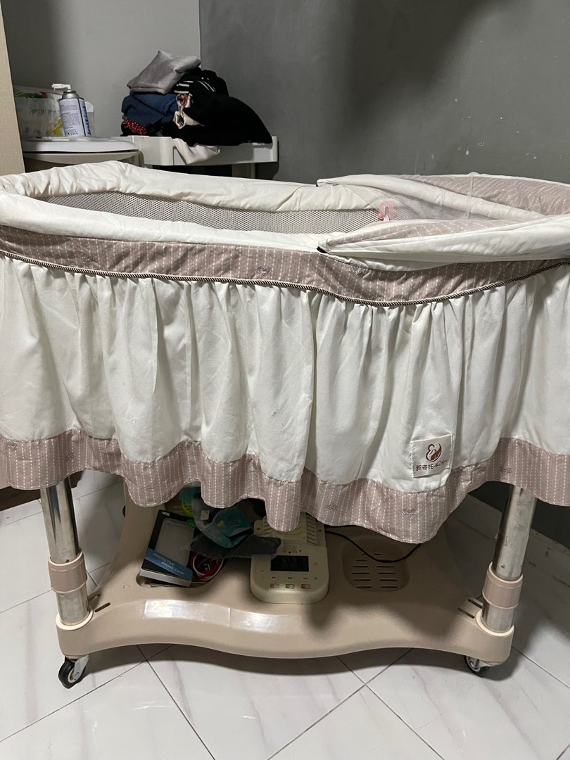 Baby cot electric clearance