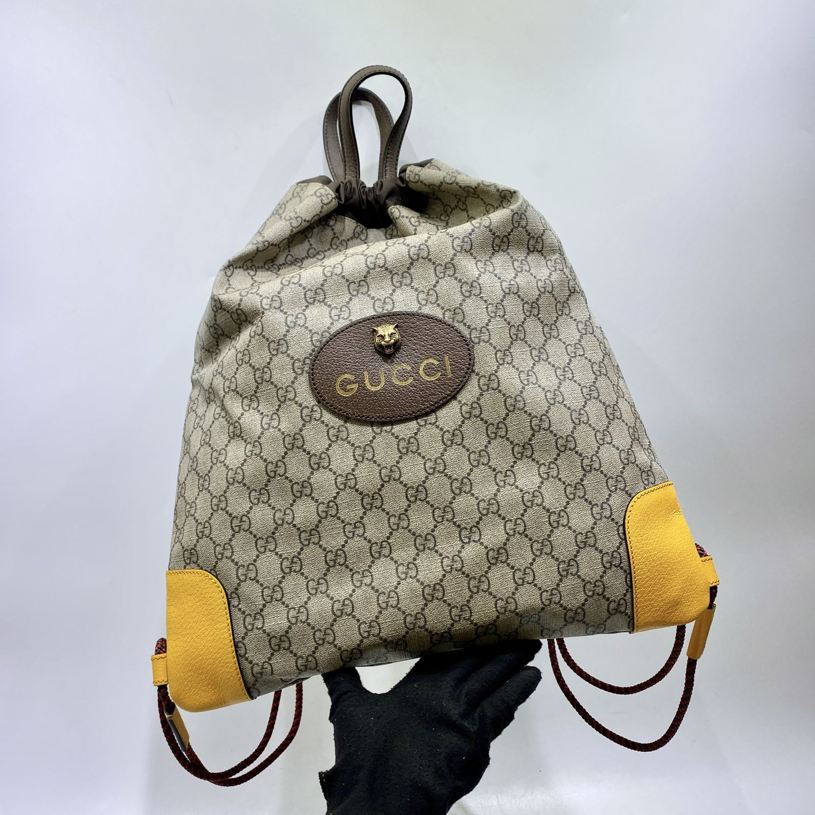 Gucci gg supreme drawstring backpack hotsell