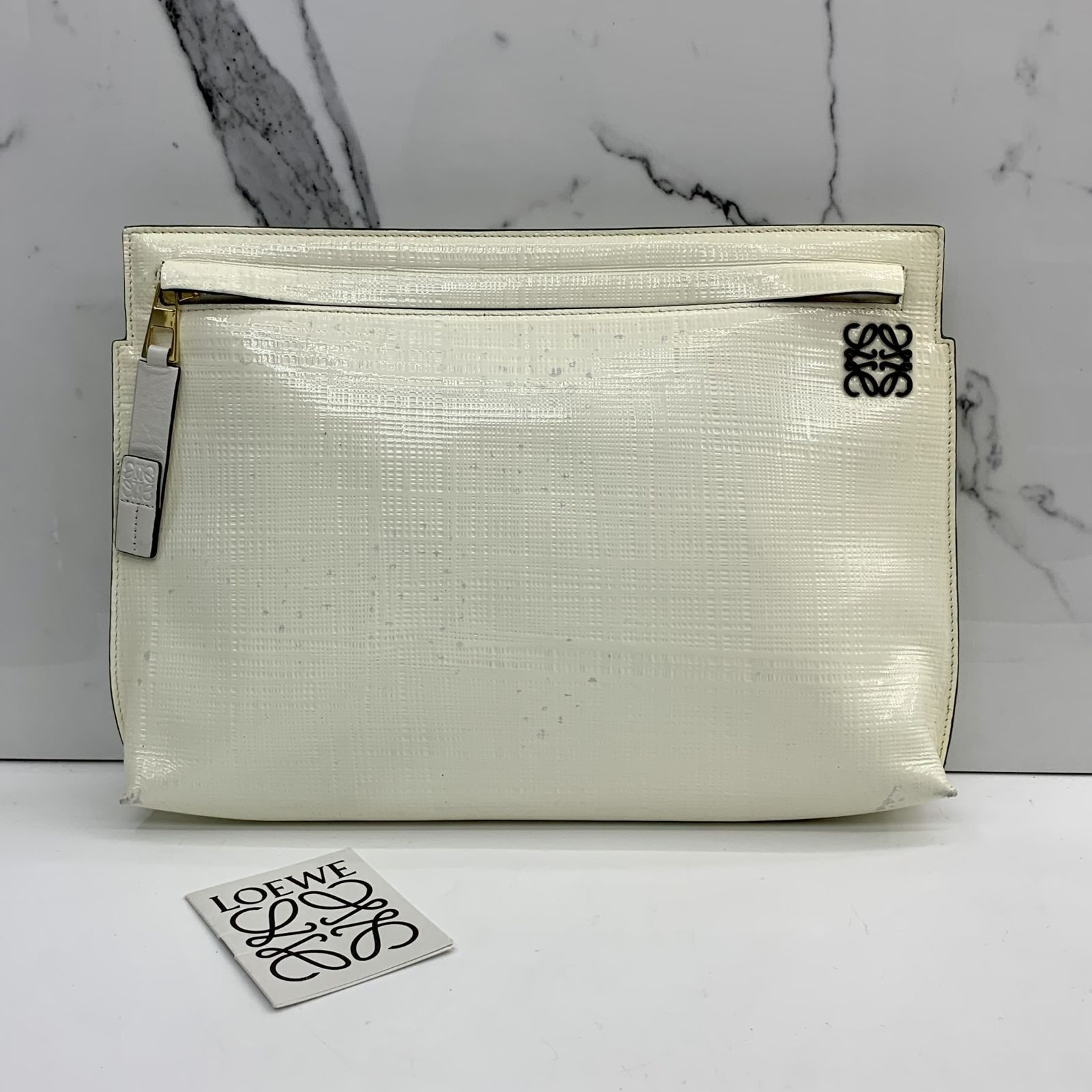 White patent clutch outlet
