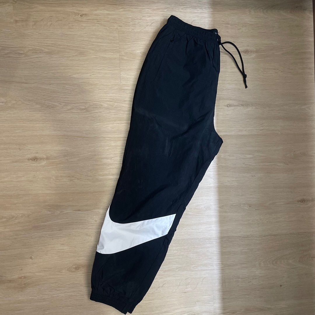 kith nike big swoosh pants