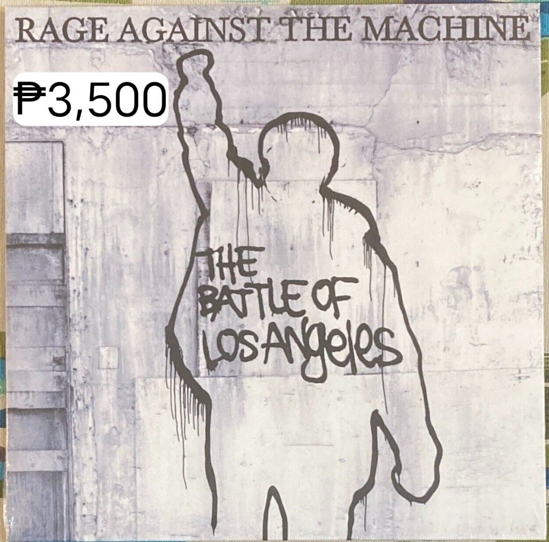Rage against the machine vinyl record/album (Category: Vinyls) located in Manila. Submitted by jhenaloymerchandise (Listing ID 1240695143, Image 1). Description: Rage Against The Machine - Renegades (LP) = ₱3,750 Rage Against The Machine - Battle of Los Angeles = ₱3,500 Rage Against The Machine - Self-Titled = ₱3,500 Rage Against The Machine - Self-Titled (Picture disc) = ₱3,750 All brand new sealed made in USA.