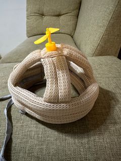 Topi pelindung bayi