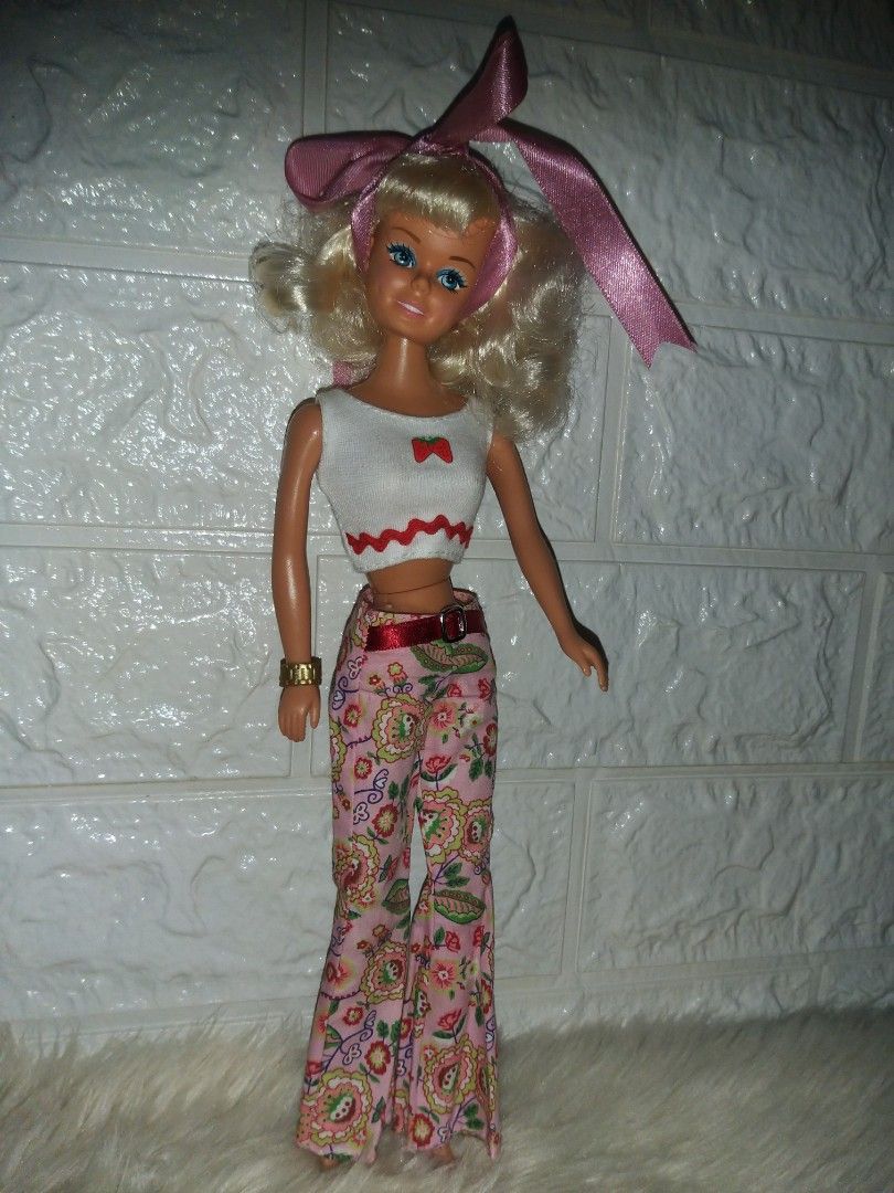 Vintage Rare Toymax Talking Debbie Doll (Category: Kids Toys) located in Cavite. Submitted by Mavee (Listing ID 1240761046, Image 3). Description: Hard to find rare 80's doll Authentic Toymax Talking Lizzie/Debbie Doll, With complete markings (Not tested if working) But the doll has really tight joints and neck No flaws at all, hair has original curls, not boiled washed, rubber legs like vintage barbie' Perfect for Doll collectors🥰 Selling for a