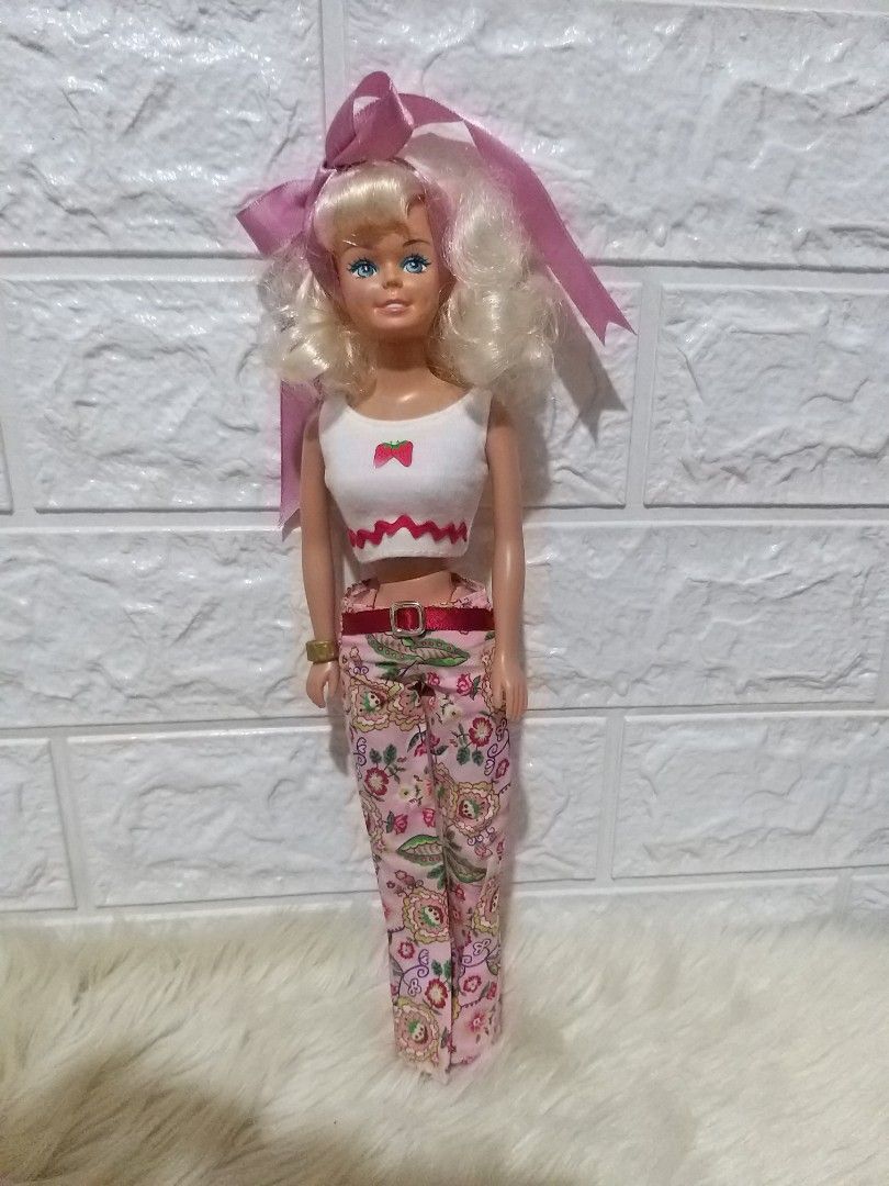 Vintage Rare Toymax Talking Debbie Doll (Category: Kids Toys) located in Cavite. Submitted by Mavee (Listing ID 1240761046, Image 2). Description: Hard to find rare 80's doll Authentic Toymax Talking Lizzie/Debbie Doll, With complete markings (Not tested if working) But the doll has really tight joints and neck No flaws at all, hair has original curls, not boiled washed, rubber legs like vintage barbie' Perfect for Doll collectors🥰 Selling for a