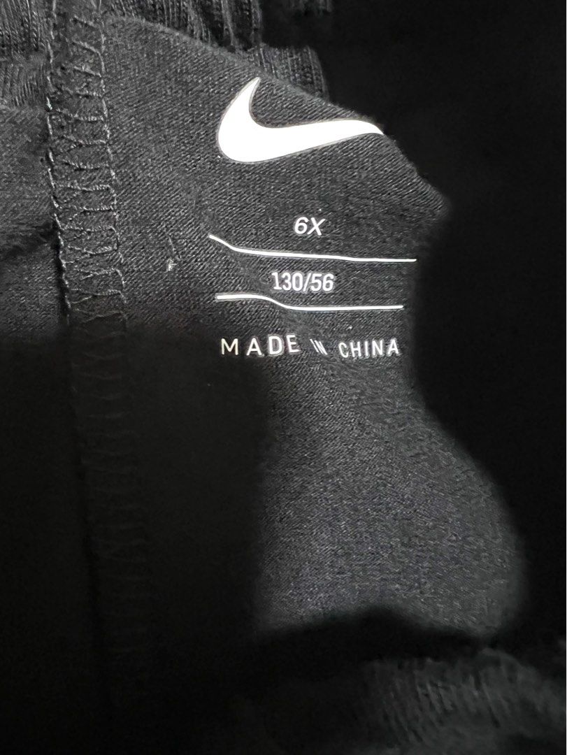 Girls black and white nikes 2025